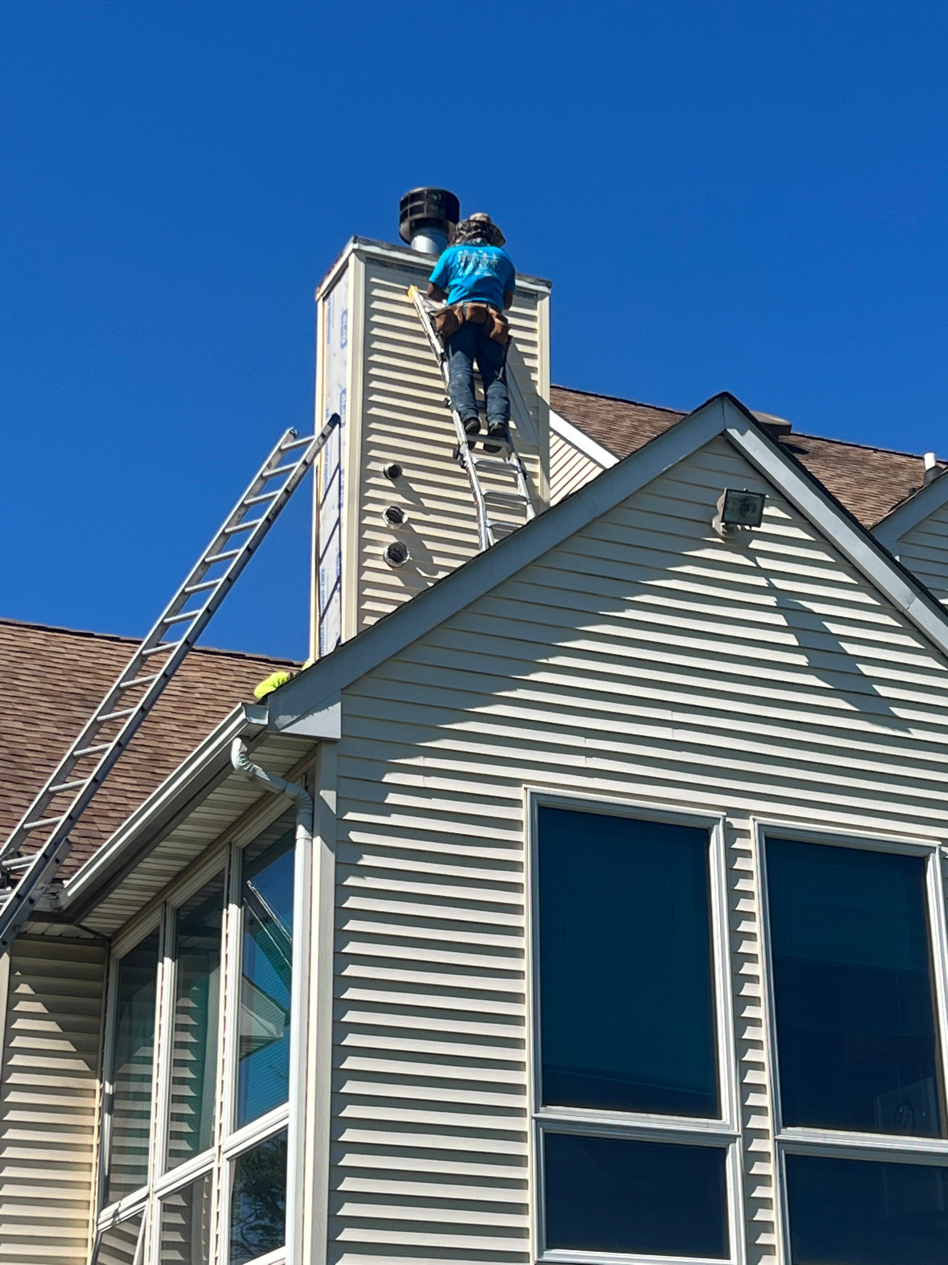 Chimney Work on Tall Home